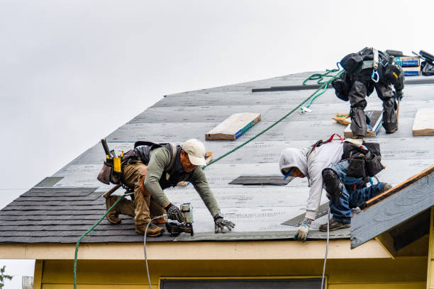 Professional Gutter Installation technician working in Still River, MA